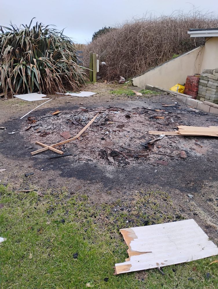 Damaged and muddy play area at Seaview Holiday Park with debris